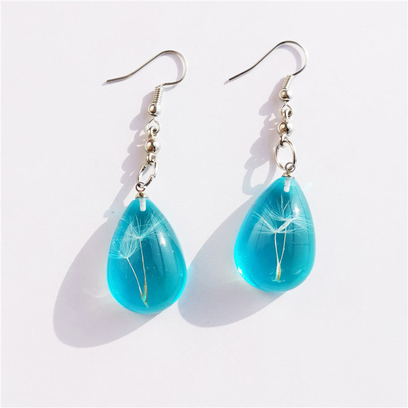 Wholesale  selling resin drop glue dandelion dried flower earrings and the United States dried flower earrings manufacturers